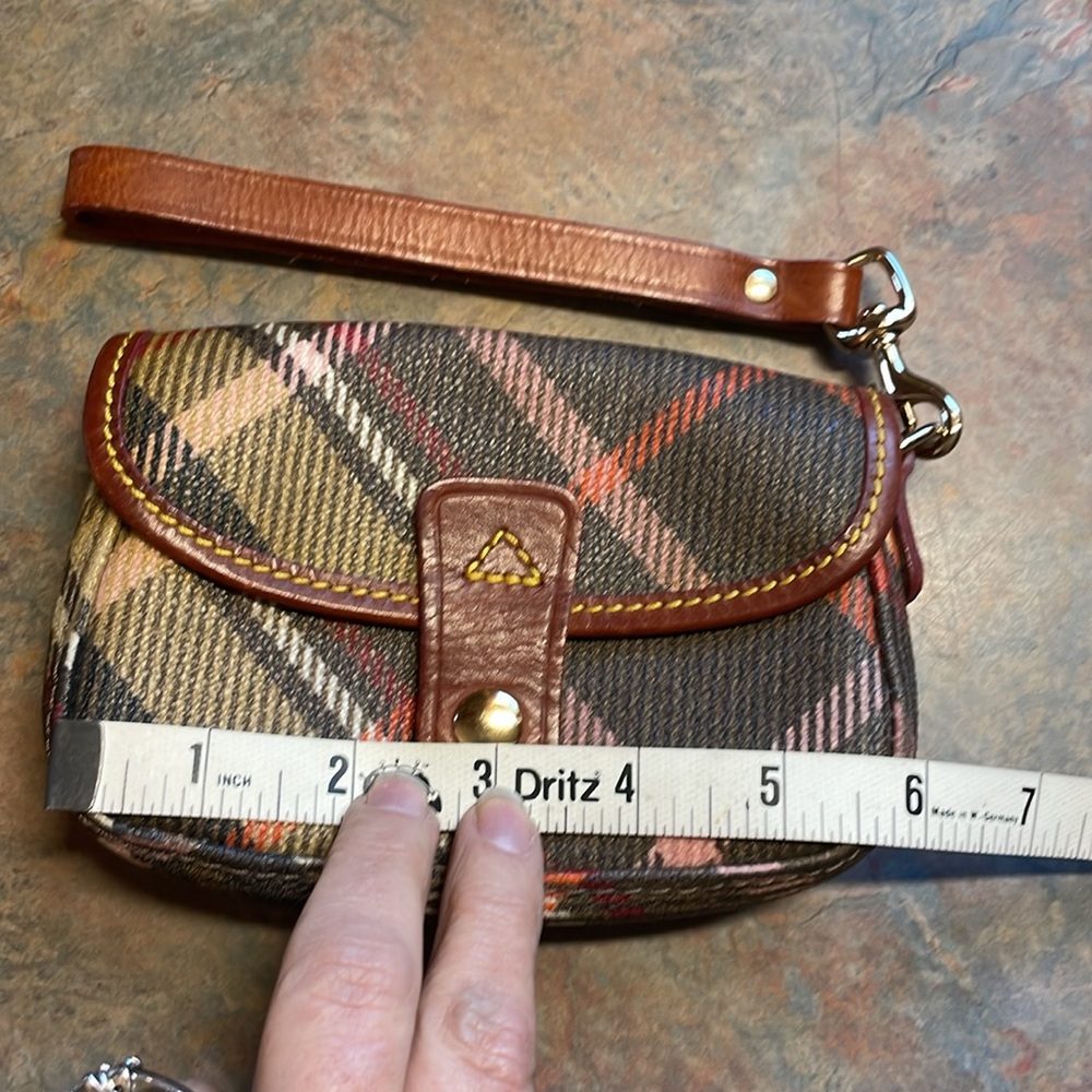 Dooney & Bourke brown plaid wristlet with cognac leather trim and strap. - Picture 2 of 7